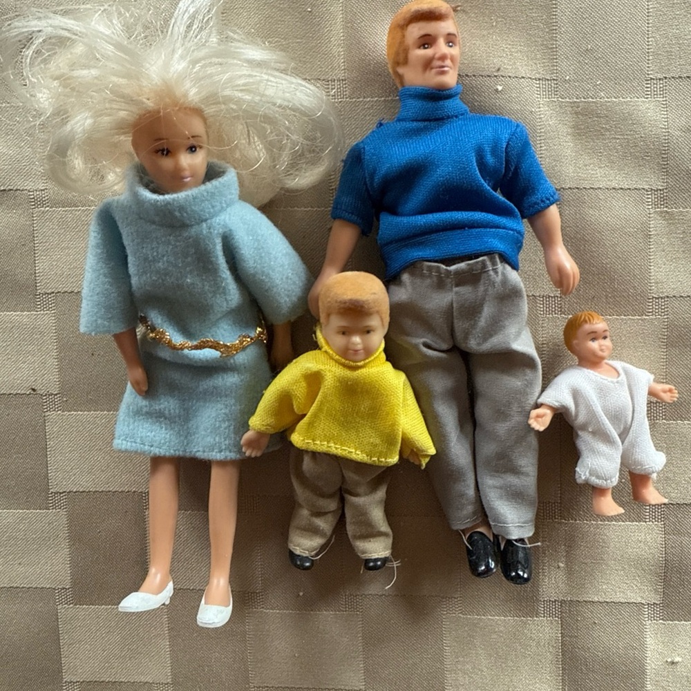 Family Doll Set with Blue, Yellow, and White Outfits